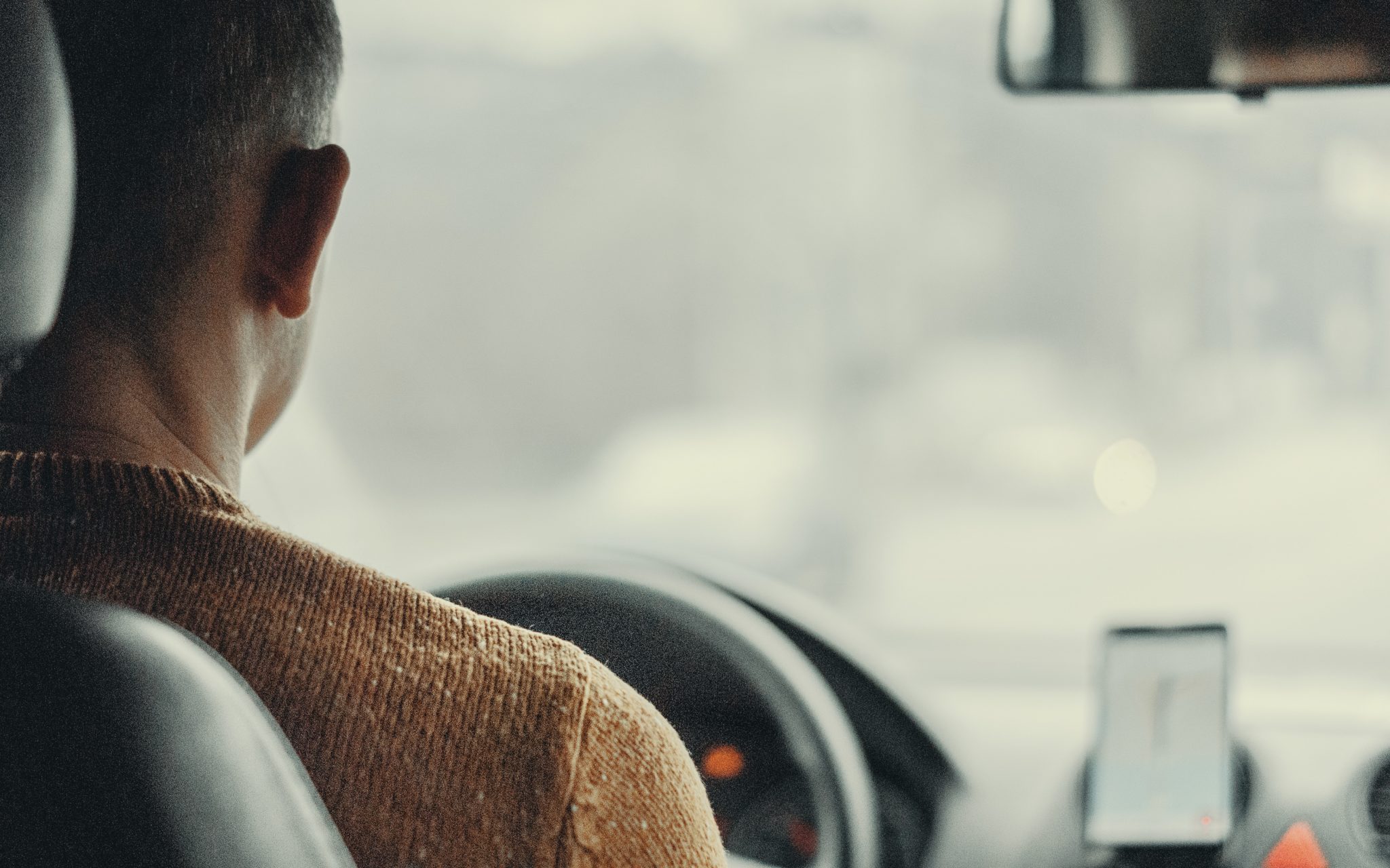 man-driving-vehicle