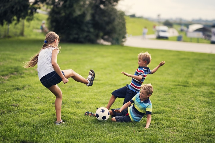 children-playing-soccer