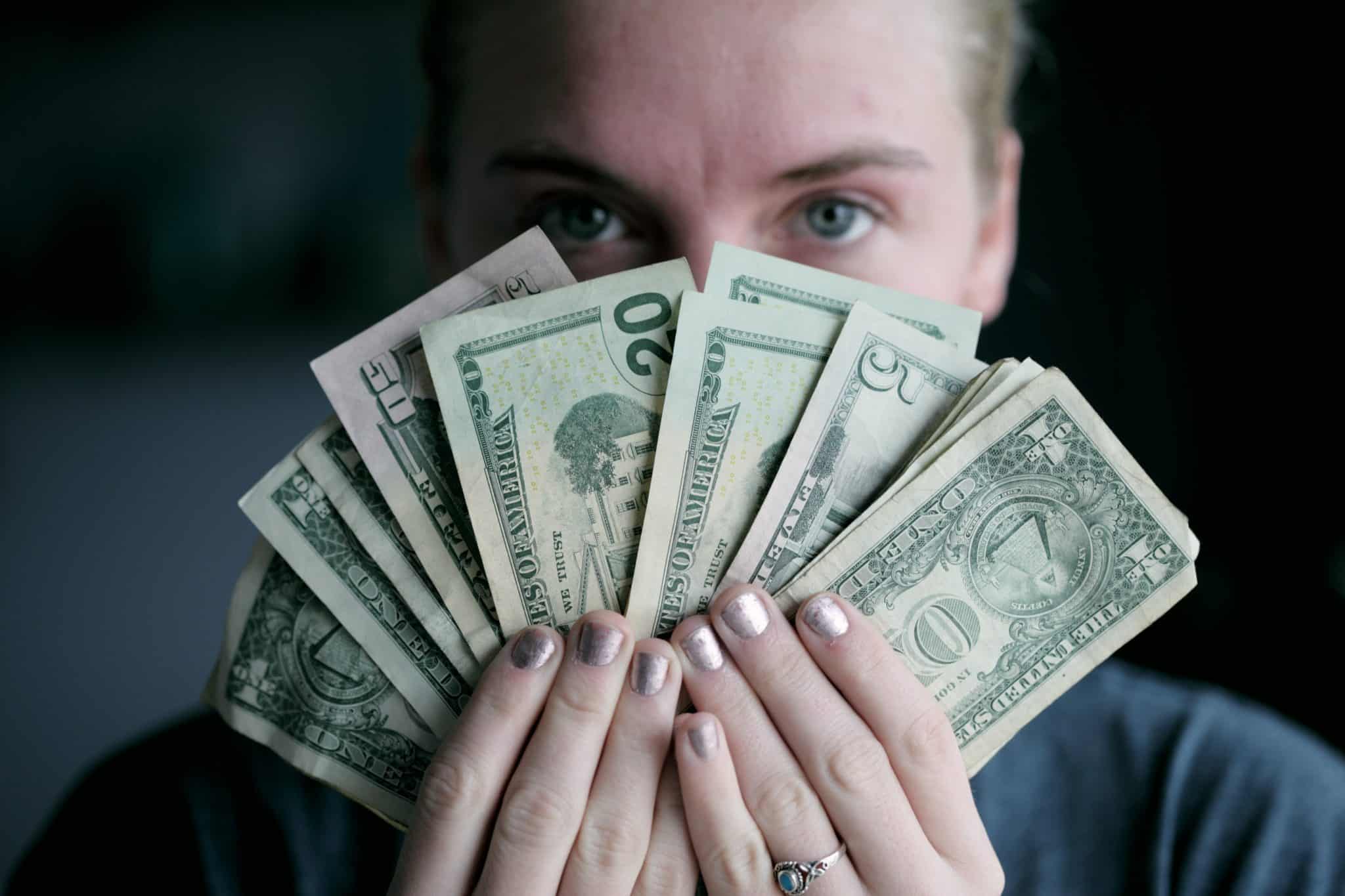 woman-holding-money