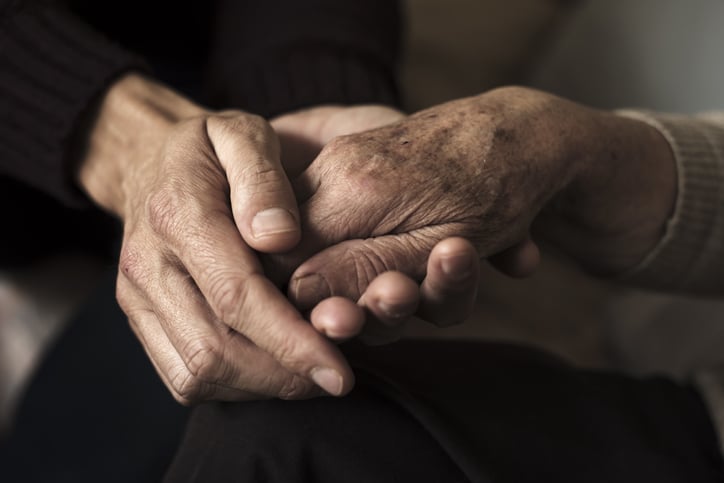young-and-elderly-holding-hands