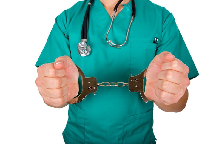 doctor-in-handcuffs