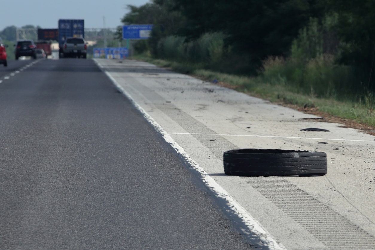 tire on side of the freeway