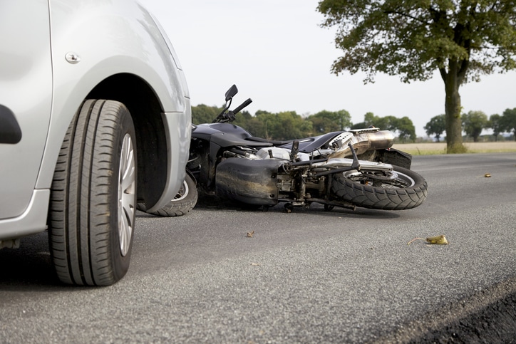 Motorbike Accident on the road with a car