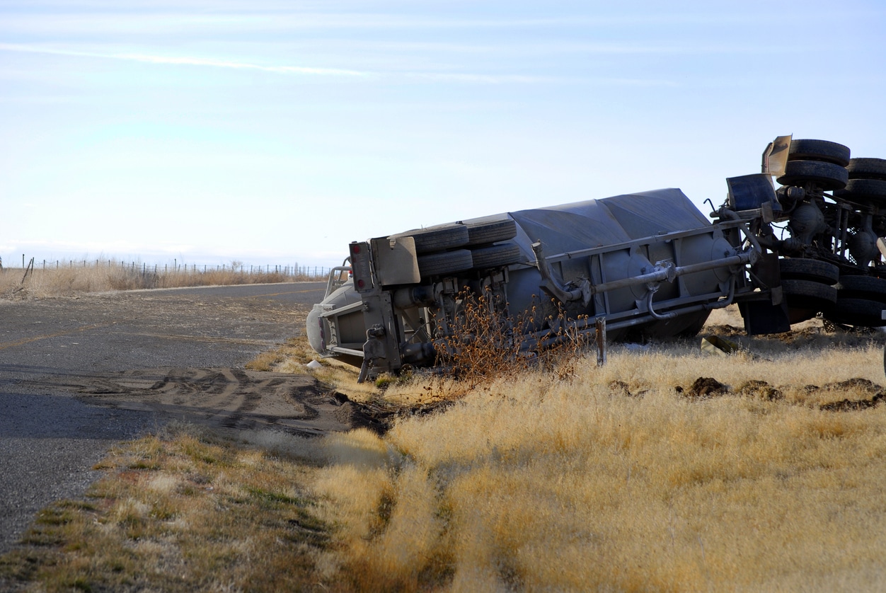 Car wreck of semi truck trailer rolled over crash crashed wrecked rollover