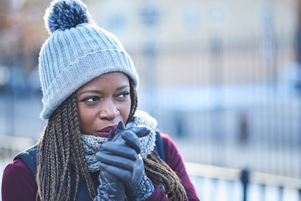 Shot of a beautiful young woman looking thoughtful on a wintery day outdoors