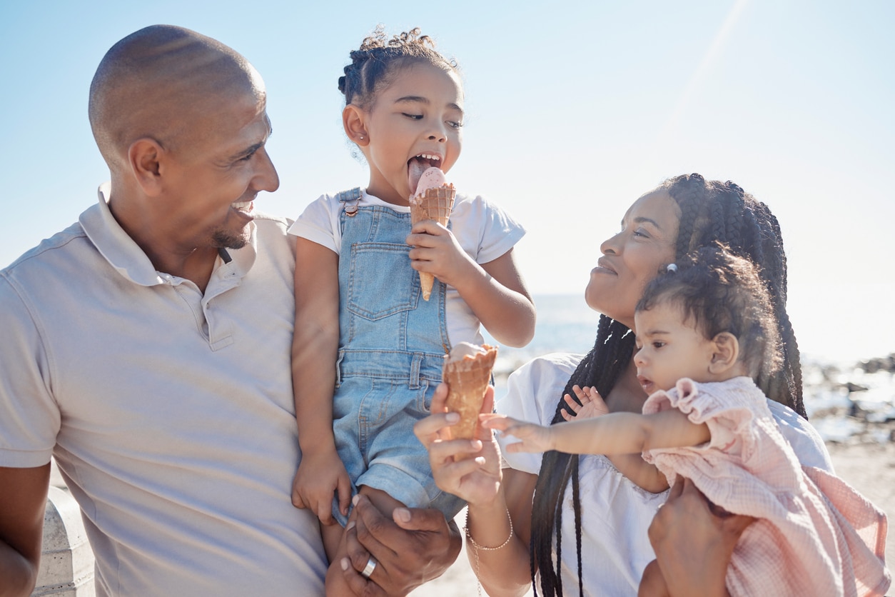 family having fun eating ice cream together