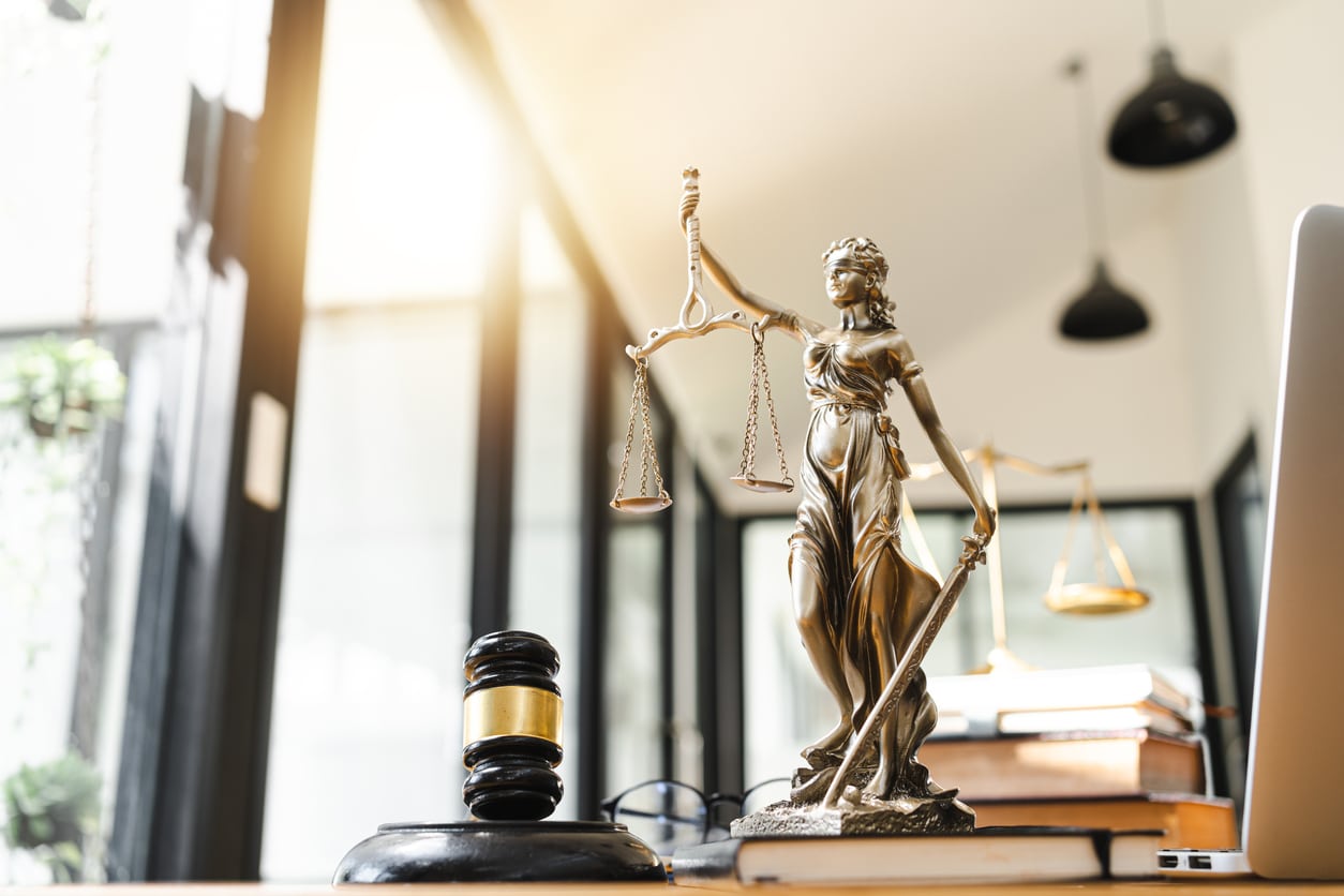 Scales of Justice Sitting on Desk