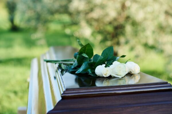casket with flowers on top avon indiana wrongful death lawyer
